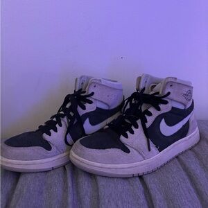 Grey and black air jordans